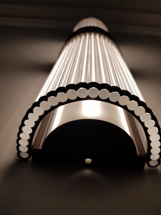 Reeded glass wall light